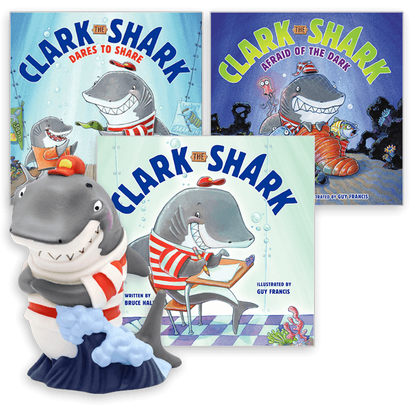 A 'Clark the Shark' collection featuring three books: 'Clark the Shark Dares to Share,' 'Clark the Shark: Afraid of the Dark,' and the original 'Clark the Shark,' accompanied by a Clark the Shark figurine wearing his signature red-and-white striped shirt.